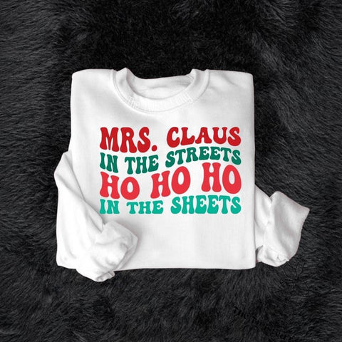 Mrs. claus in the streets